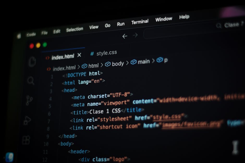 A computer screen displaying HTML code for a webpage, with visible lines of syntax highlighting in various colors such as blue, orange, and white. The code includes tags like <html>, <head&gt