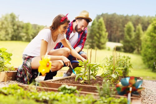 Professional gardener working on a garden